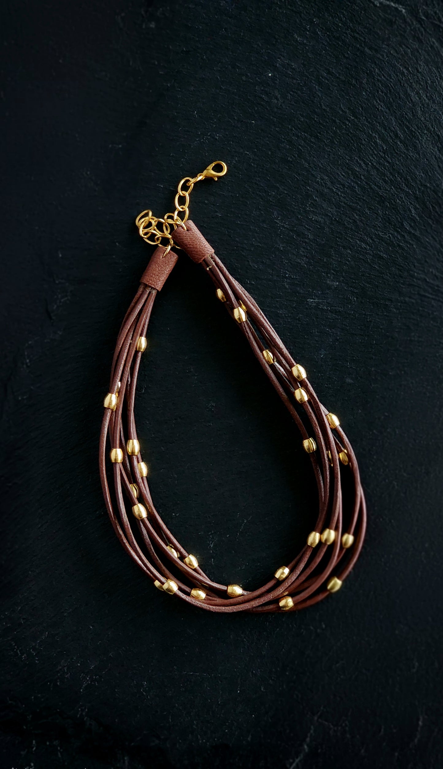 Tan Orbit Neckpiece